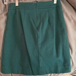 Turquoise skirt with button details